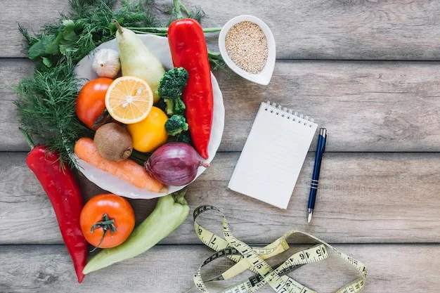 Mesa de consultorio con báscula, cinta métrica y un plato de fruta fresca